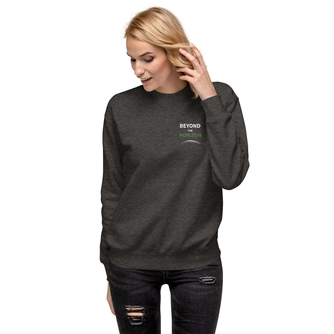 Model wearing Beyond the Horizon Unisex Premium Sweatshirt in charcoal gray, showcasing a stylish streetwear look.