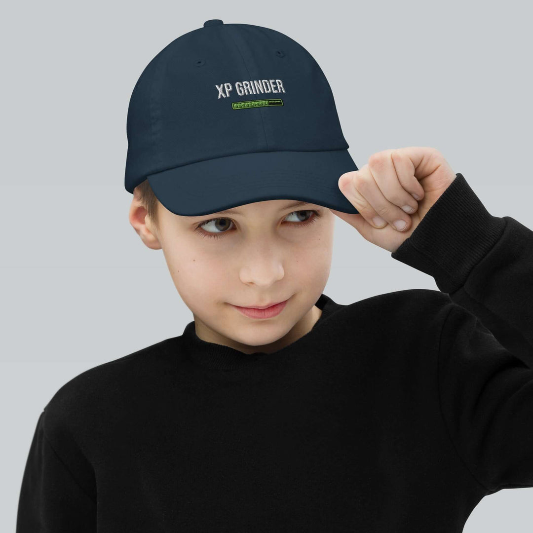 XP Grinder Youth baseball cap on a child, offering style and sun protection for baseball training and play.