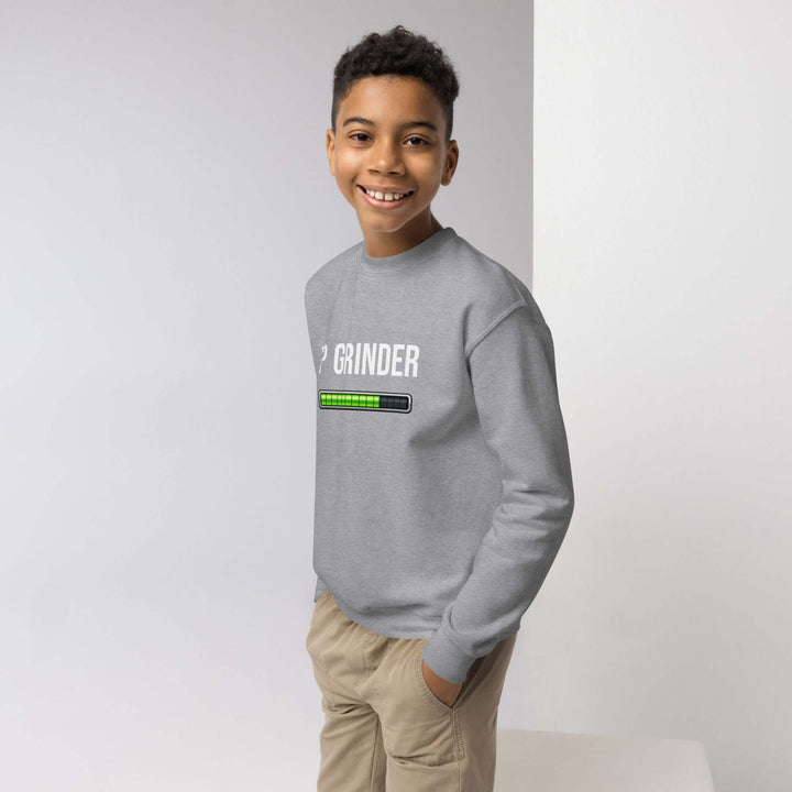 XP Grinder Youth crewneck sweatshirt in gray, styled on a young boy smiling.